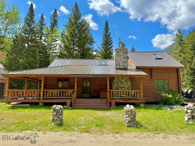 14 Ken Dan, Mcleod, MT 59052 - log cabin with log siding, metal roof, and covered porch