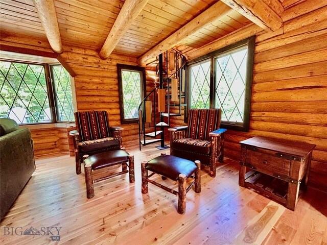 14 Ken Dan, Mcleod, MT 59052 - living area with hardwood / wood-style flooring, wood ceiling with exposed beams, and log walls