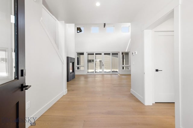 4149 Annie St, Bozeman, MT 59718 - hallway with light wood-style flooring, healthy amount of natural light, baseboards, and recessed lighting