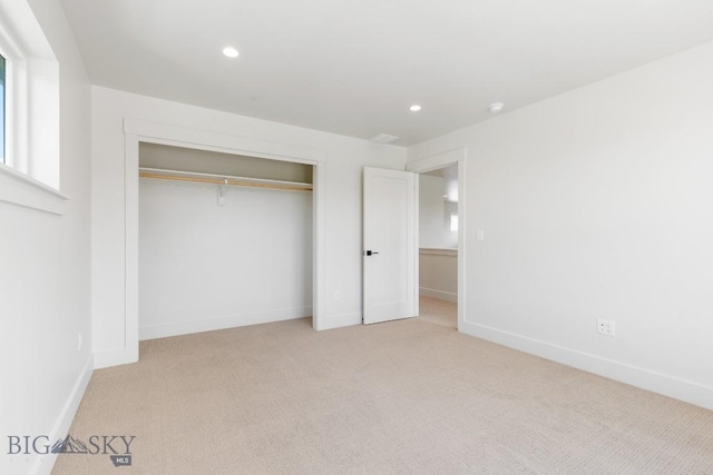 4149 Annie St, Bozeman, MT 59718 - unfurnished bedroom with carpet, baseboards, a closet, and recessed lighting