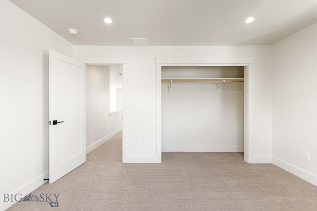 4149 Annie St, Bozeman, MT 59718 - unfurnished bedroom featuring carpet flooring, recessed lighting, a closet, and baseboards