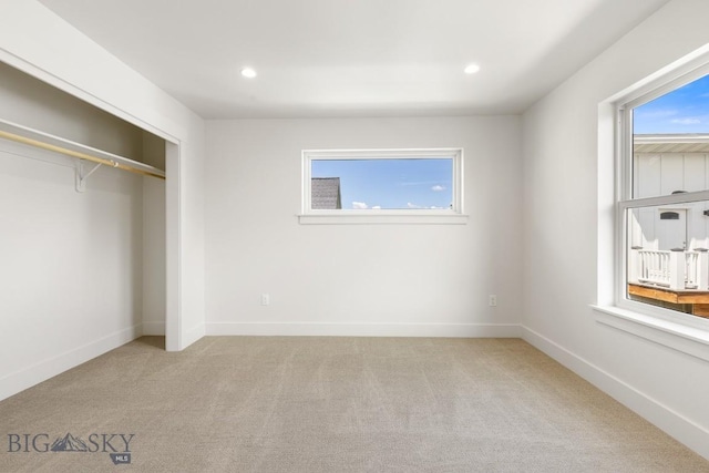 4149 Annie St, Bozeman, MT 59718 - unfurnished bedroom with carpet flooring, recessed lighting, baseboards, and a closet