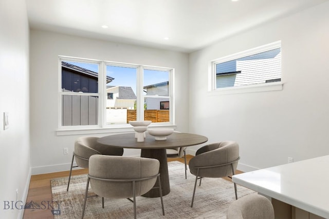 4149 Annie St, Bozeman, MT 59718 - dining space with baseboards, wood finished floors, and recessed lighting
