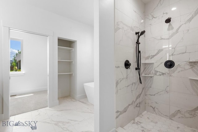 4149 Annie St, Bozeman, MT 59718 - bathroom featuring a marble finish shower, a freestanding bath, and marble finish floors