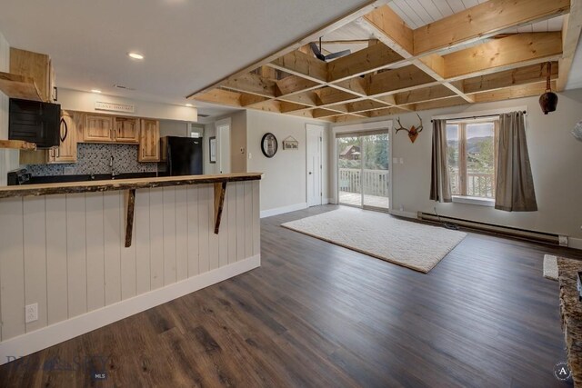 3456 Wave, Helena, MT 59602 - kitchen featuring freestanding refrigerator, dark wood-style flooring, baseboards, baseboard heating, and decorative backsplash