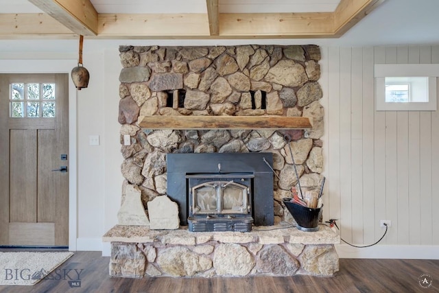 3456 Wave, Helena, MT 59602 - detailed view of baseboards, wood finished floors, and beam ceiling