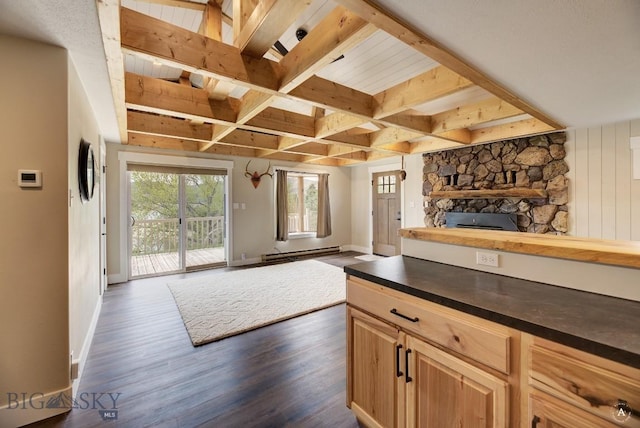 3456 Wave, Helena, MT 59602 - kitchen with open floor plan, baseboards, butcher block countertops, dark wood-type flooring, and beamed ceiling