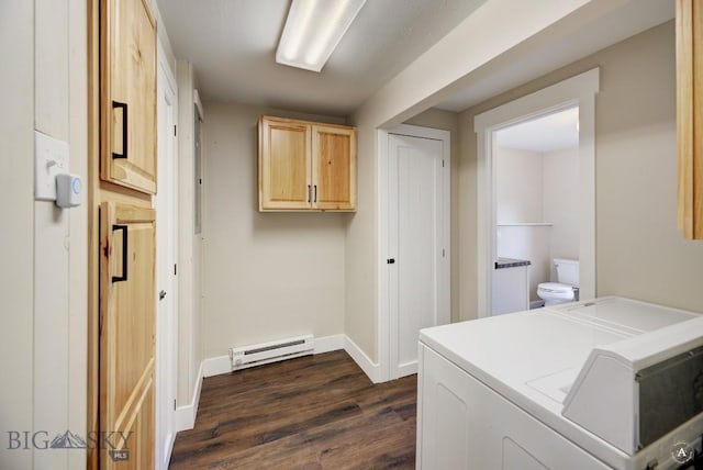 3456 Wave, Helena, MT 59602 - washroom with baseboard heating, washing machine and dryer, dark wood finished floors, cabinet space, and baseboards