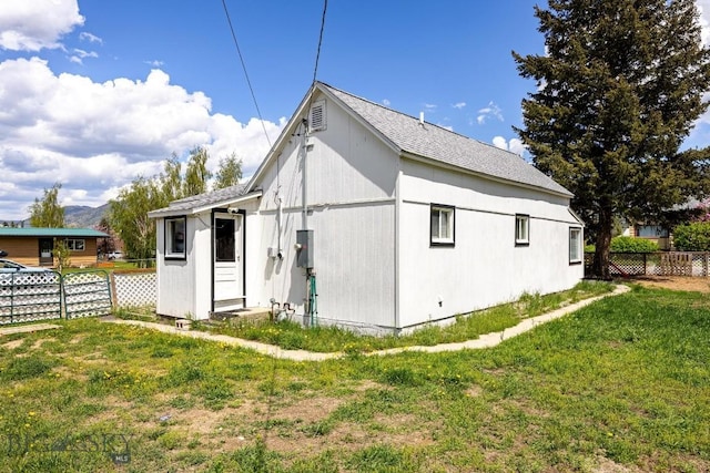 3101 Paxson, Butte, MT 59701 - back of property with a shingled roof