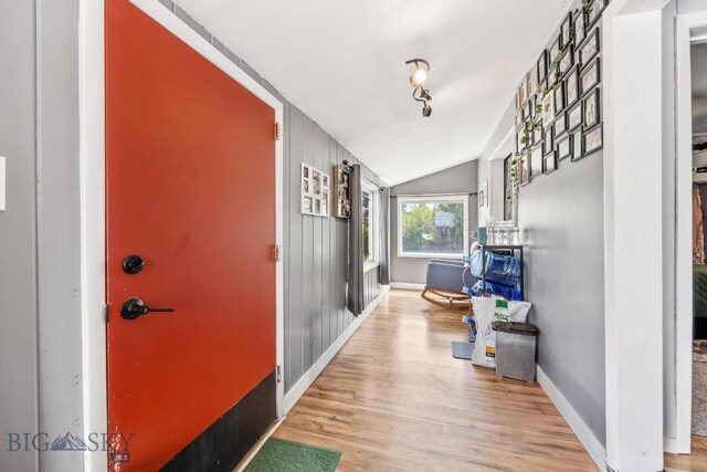 3101 Paxson, Butte, MT 59701 - entrance foyer featuring vaulted ceiling, wood finished floors, and baseboards