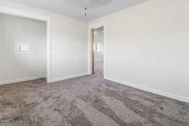 9 Murray Ln, Three Forks, MT 59721 - spare room with carpet floors and baseboards