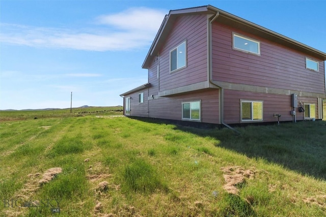 9 Murray Ln, Three Forks, MT 59721 - view of property exterior featuring a lawn