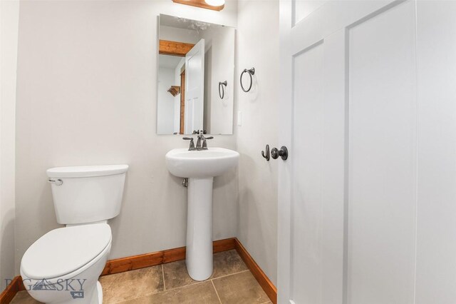 9 Murray Ln, Three Forks, MT 59721 - half bath featuring baseboards and toilet