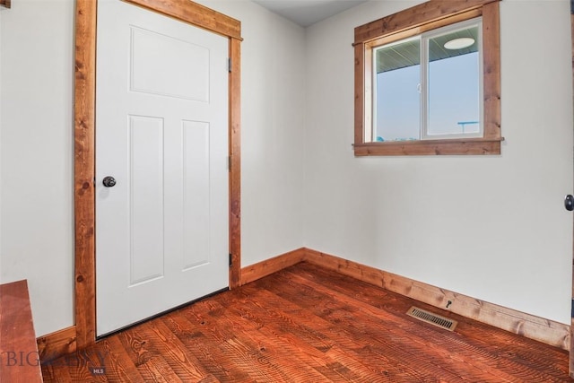 9 Murray Ln, Three Forks, MT 59721 - unfurnished room featuring baseboards and dark wood finished floors