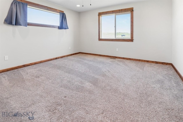 9 Murray Ln, Three Forks, MT 59721 - spare room with carpet flooring and recessed lighting