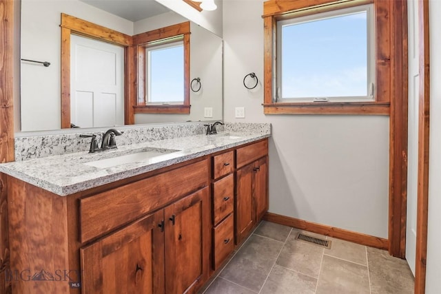 9 Murray Ln, Three Forks, MT 59721 - bathroom with baseboards and double vanity