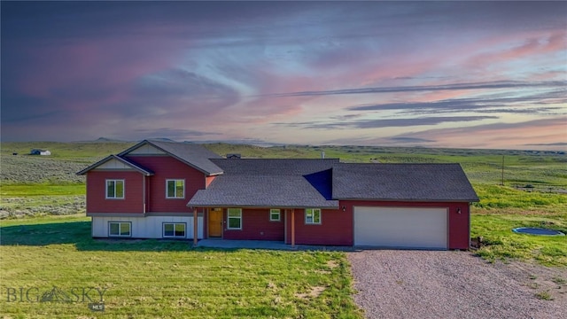 9 Murray Ln, Three Forks, MT 59721 - view of front of home featuring a garage, driveway, and a front yard