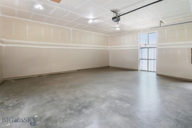 9 Murray Ln, Three Forks, MT 59721 - garage with baseboards and a garage door opener