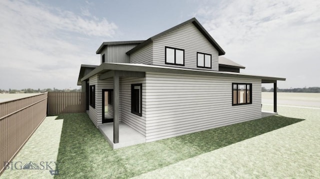 286 Lion Peak, Bozeman, MT 59718 - view of side of home featuring a fenced backyard and a patio