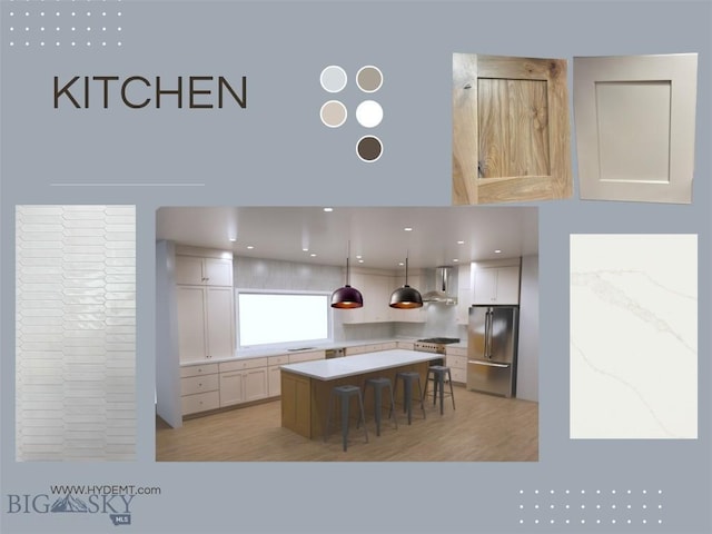 286 Lion Peak, Bozeman, MT 59718 - kitchen featuring freestanding refrigerator, wall chimney exhaust hood, a kitchen island, a kitchen breakfast bar, and light countertops