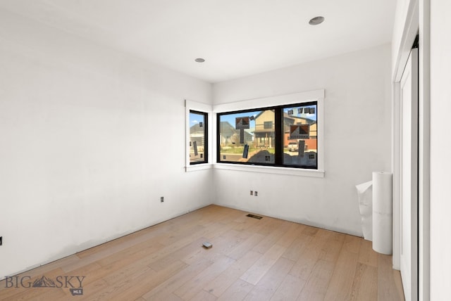 286 Lion Peak, Bozeman, MT 59718 - unfurnished room with light wood-type flooring and recessed lighting