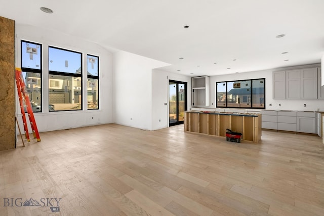 286 Lion Peak, Bozeman, MT 59718 - unfurnished living room featuring light wood-type flooring