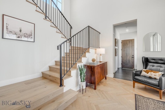 529 Clancy Way, Bozeman, MT 59718 - stairs featuring baseboards and a towering ceiling