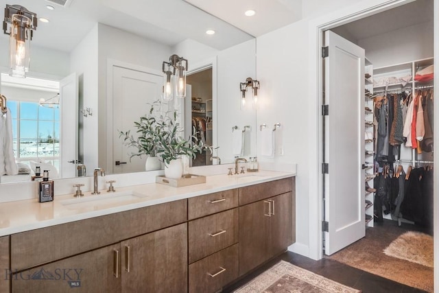 529 Clancy Way, Bozeman, MT 59718 - full bath featuring double vanity, a walk in closet, and recessed lighting