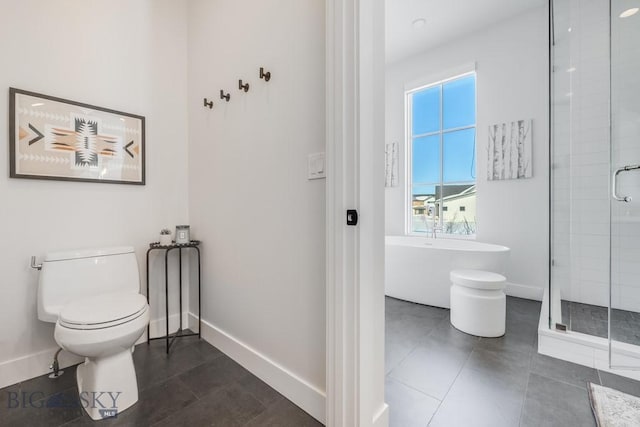 529 Clancy Way, Bozeman, MT 59718 - bathroom with a freestanding tub, plenty of natural light, a stall shower, and tile patterned flooring
