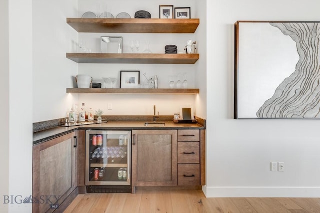 529 Clancy Way, Bozeman, MT 59718 - indoor wet bar featuring wine cooler and light wood-style floors