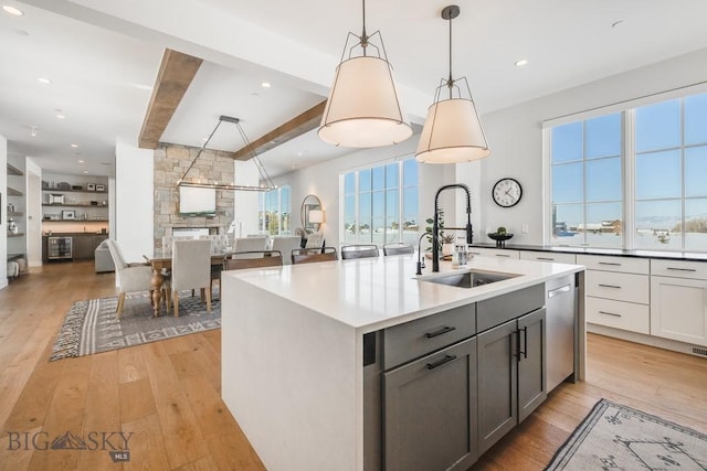 529 Clancy Way, Bozeman, MT 59718 - kitchen with beamed ceiling, gray cabinets, light wood-type flooring, open floor plan, and recessed lighting