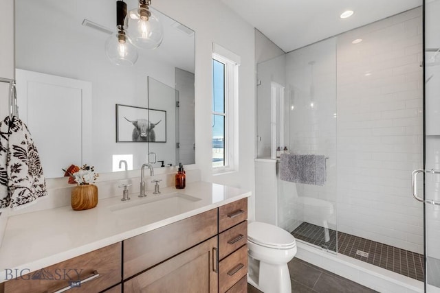 529 Clancy Way, Bozeman, MT 59718 - bathroom with vanity, tile patterned flooring, a stall shower, and recessed lighting