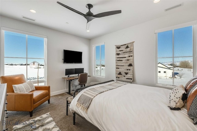 529 Clancy Way, Bozeman, MT 59718 - carpeted bedroom featuring multiple windows, a ceiling fan, recessed lighting, and a desk