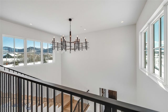 529 Clancy Way, Bozeman, MT 59718 - hall featuring a chandelier, an upstairs landing, a mountain view, and recessed lighting