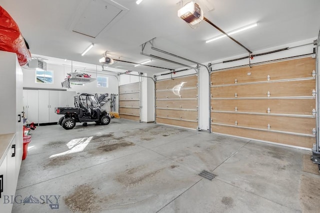 529 Clancy Way, Bozeman, MT 59718 - garage featuring a garage door opener