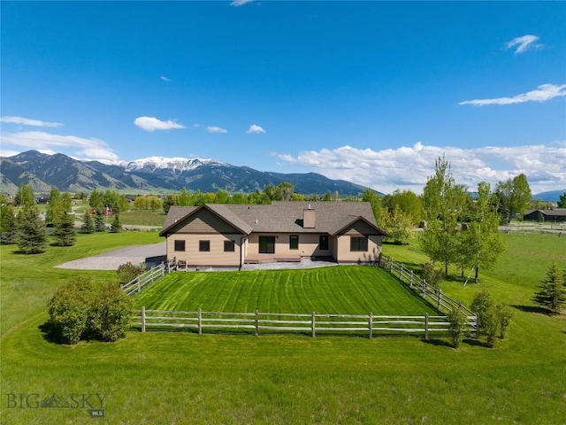 45 Spain Bridge Circle Dr, Belgrade, MT 59714 - rear view of house featuring a mountain view, a view of countryside, and a patio area