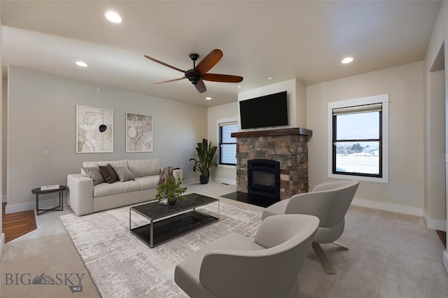 45 Spain Bridge Circle Dr, Belgrade, MT 59714 - carpeted living room with recessed lighting, baseboards, a stone fireplace, and a ceiling fan