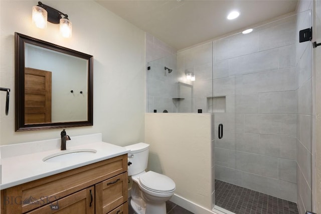 45 Spain Bridge Circle Dr, Belgrade, MT 59714 - full bath featuring vanity, a stall shower, toilet, and recessed lighting