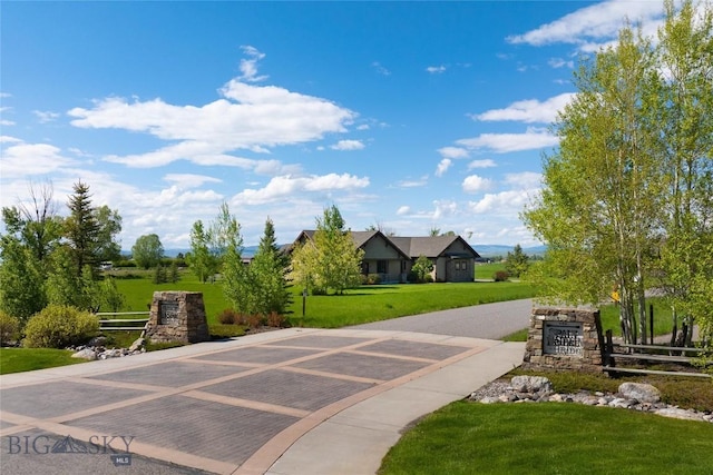 45 Spain Bridge Circle Dr, Belgrade, MT 59714 - view of home's community featuring a yard