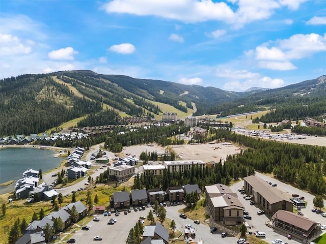 21 Sitting Bull Rd Unit 1190, Big Sky, MT 59716 - aerial view of a water and mountain view and a forest