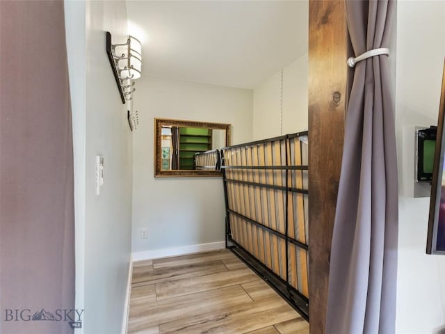21 Sitting Bull Rd Unit 1190, Big Sky, MT 59716 - stairway with wood finished floors and baseboards