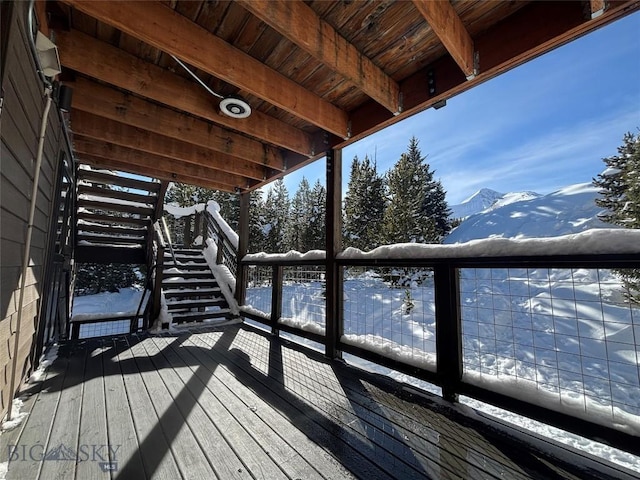 21 Sitting Bull Rd Unit 1190, Big Sky, MT 59716 - snow covered deck with stairway
