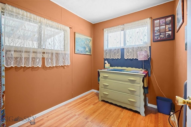 8422 Lake Park Trl, Helena, MT 59602 - detailed view of wood finished floors, baseboards, and crown molding