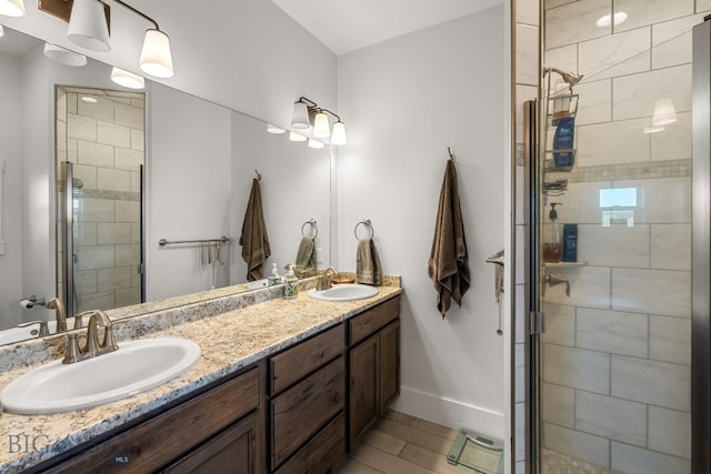 64 Duke Dr, Harrison, MT 59735 - bathroom featuring double vanity, a stall shower, and baseboards
