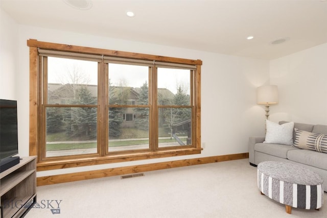151B Pheasant Tail Unit B, Big Sky, MT 59716 - carpeted living area with healthy amount of natural light, baseboards, and recessed lighting