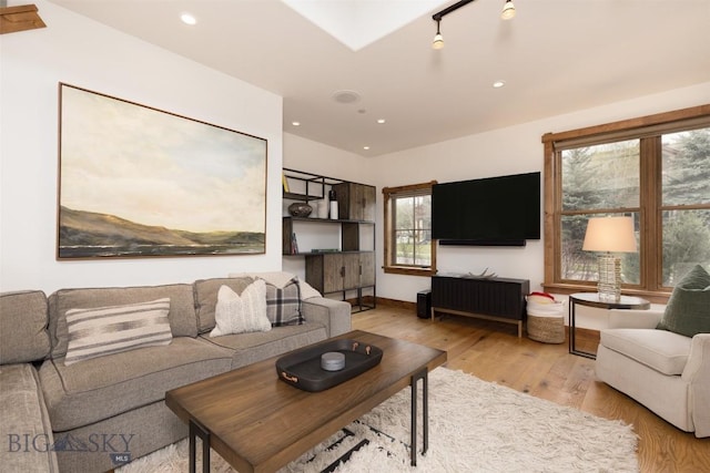 151B Pheasant Tail Unit B, Big Sky, MT 59716 - living area featuring light wood-style floors, recessed lighting, and baseboards
