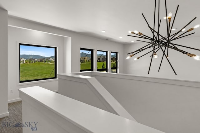 2939 S 30th Ave, Bozeman, MT 59718 - hallway featuring a chandelier, recessed lighting, carpet flooring, and baseboards