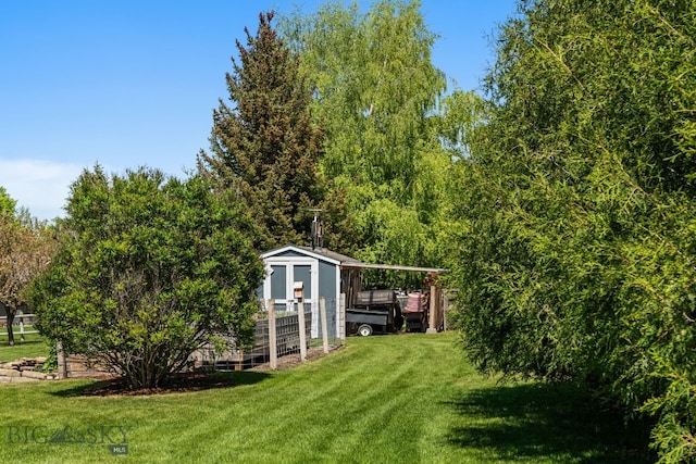 370 Prospector, Bozeman, MT 59718 - view of grassy yard with a carport