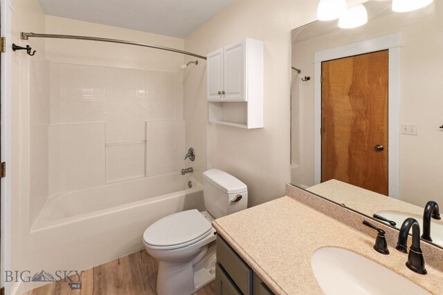 370 Prospector, Bozeman, MT 59718 - full bathroom with wood finished floors, vanity, tub / shower combination, and toilet