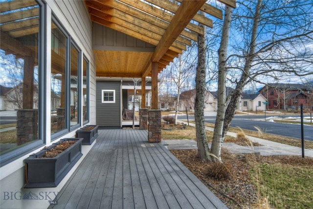113 Nash Creek Ln, Bozeman, MT 59715 - wooden porch featuring a residential view
